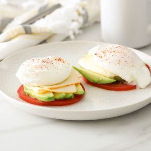 Atkins Poached Eggs over Tomato, Avocado and Muenster